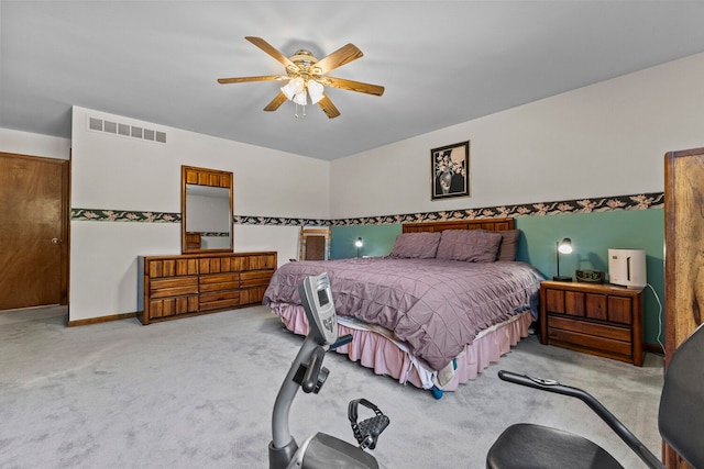 bedroom with ceiling fan and light colored carpet