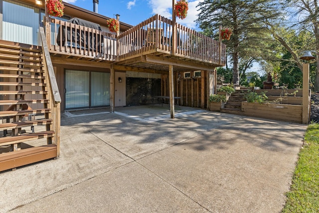 exterior space with a patio and a deck