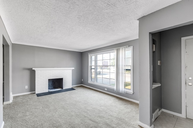 unfurnished living room with a fireplace, light carpet, and a textured ceiling