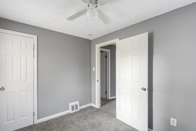 16652 Hubbell St, Detroit, MI 48235 - unfurnished bedroom with carpet, baseboards, and a ceiling fan