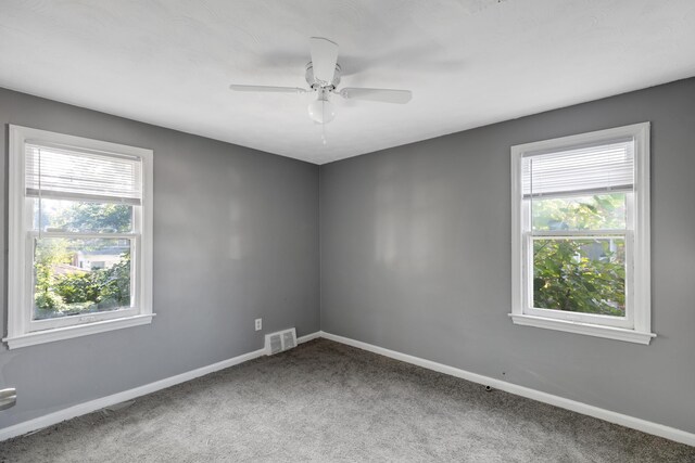 16652 Hubbell St, Detroit, MI 48235 - spare room featuring carpet floors, baseboards, and ceiling fan