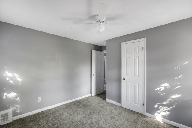 16652 Hubbell St, Detroit, MI 48235 - unfurnished bedroom with carpet flooring, baseboards, and a ceiling fan