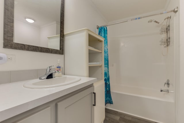 bathroom with vanity, shower / bath combo, and hardwood / wood-style flooring