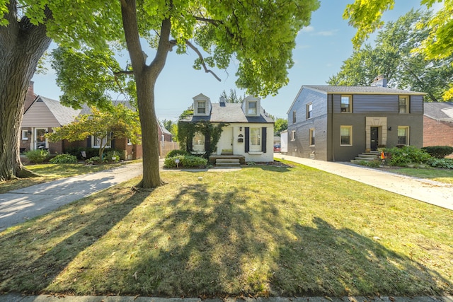 view of front of house with a front lawn