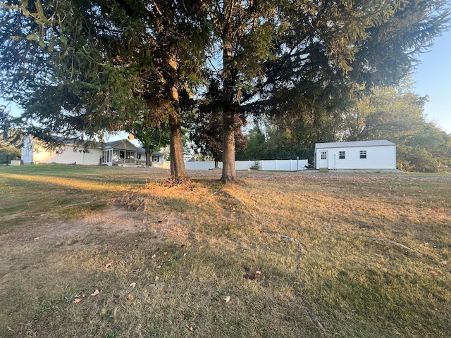 view of yard with an outdoor structure