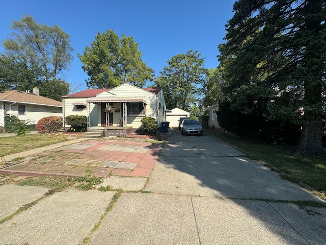 view of front of home with an outbuilding and a garage