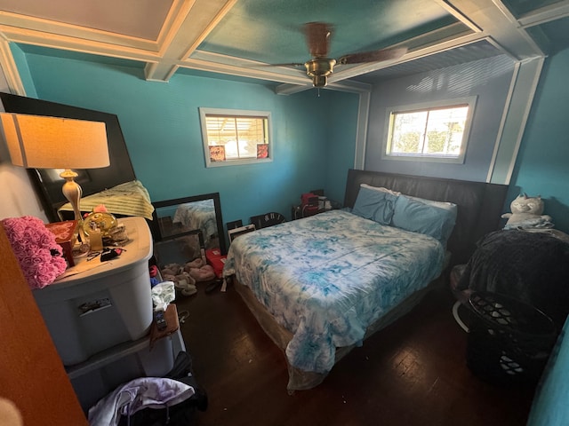 bedroom with ceiling fan and hardwood / wood-style flooring