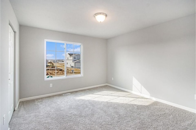 empty room with carpet floors