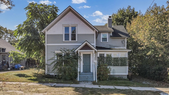 view of front of home featuring a front lawn