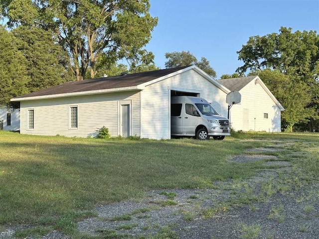 view of home's exterior with a yard