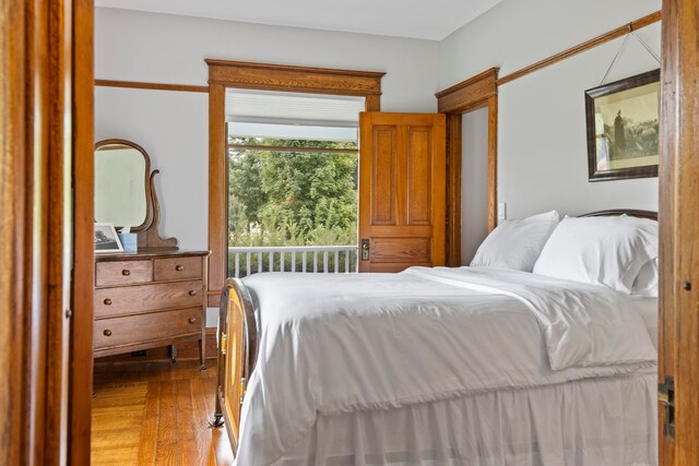 5721 Broomhead Rd, Williamsburg, MI 49690 - bedroom with wood finished floors