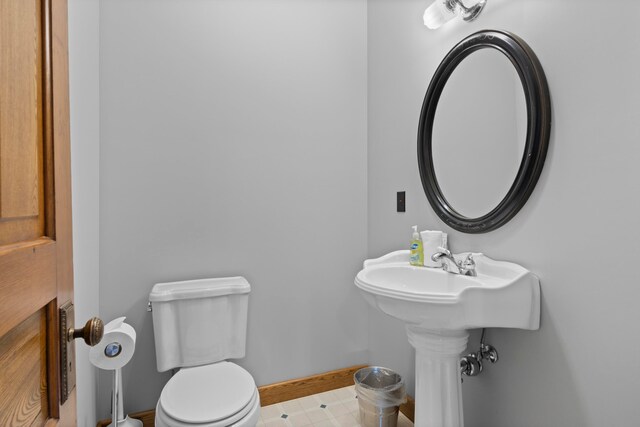 5721 Broomhead Rd, Williamsburg, MI 49690 - half bath with toilet and baseboards
