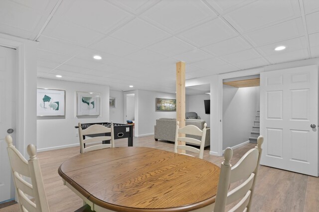 5721 Broomhead Rd, Williamsburg, MI 49690 - dining area featuring recessed lighting, light wood-style flooring, stairway, and baseboards