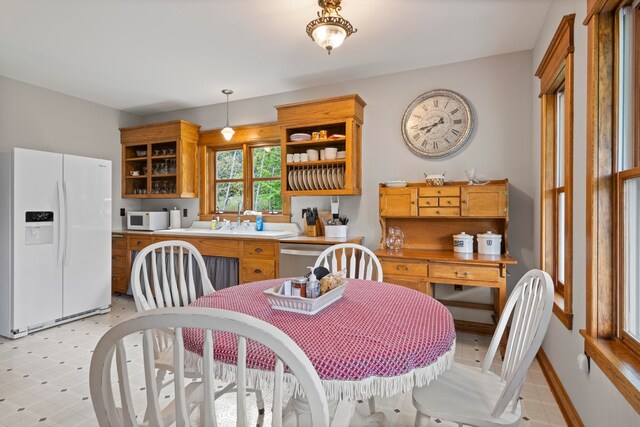 5721 Broomhead Rd, Williamsburg, MI 49690 - dining space with light floors