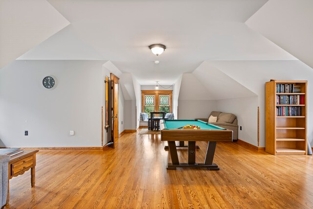 5721 Broomhead Rd, Williamsburg, MI 49690 - playroom with pool table, light wood-style floors, baseboards, and vaulted ceiling