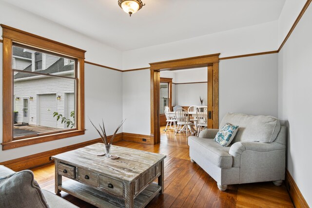 5721 Broomhead Rd, Williamsburg, MI 49690 - living area with hardwood / wood-style floors and baseboards