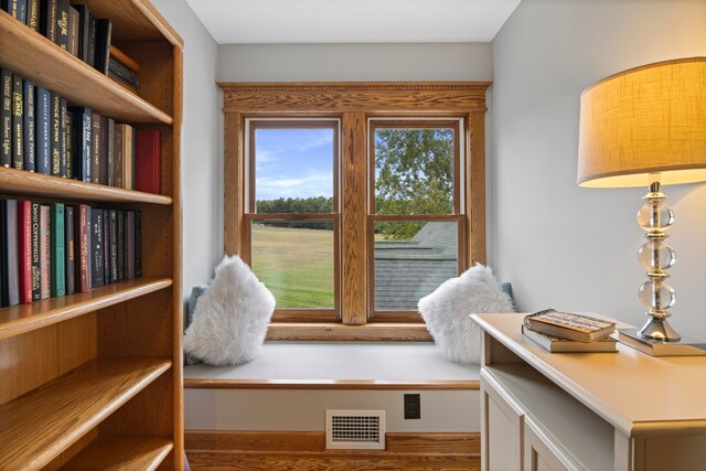5721 Broomhead Rd, Williamsburg, MI 49690 - sitting room with wood finished floors