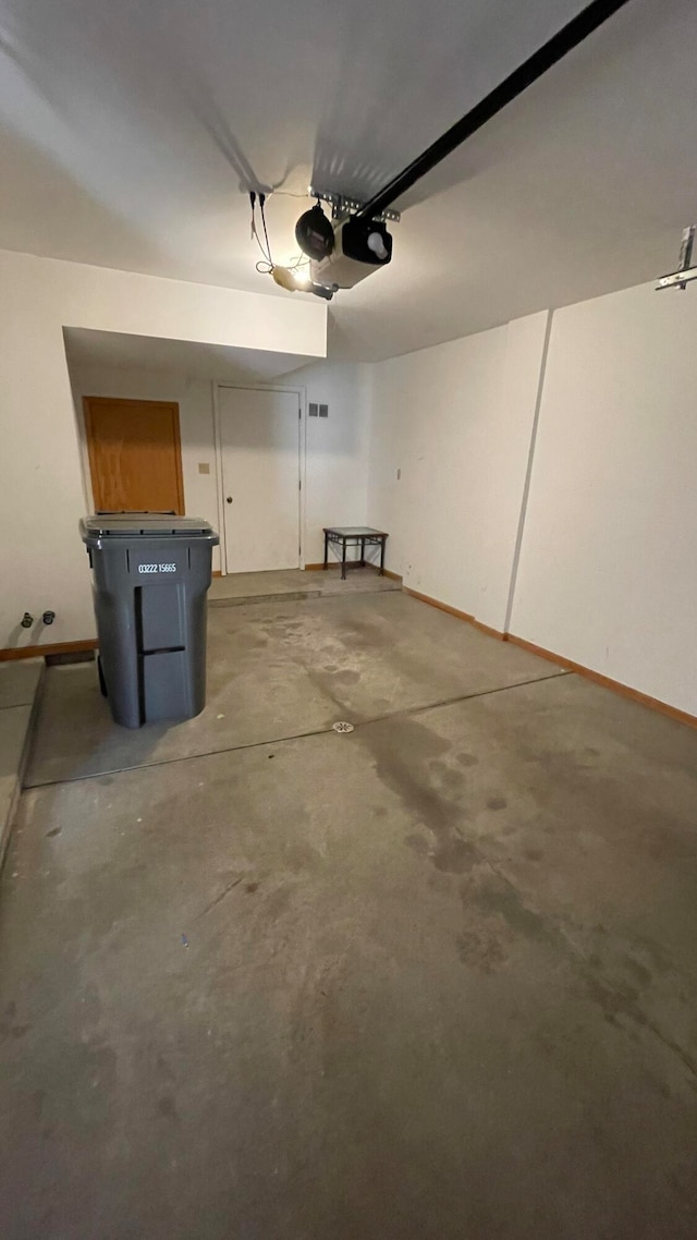 garage featuring a garage door opener