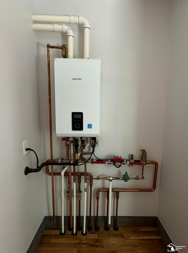 utility room with water heater