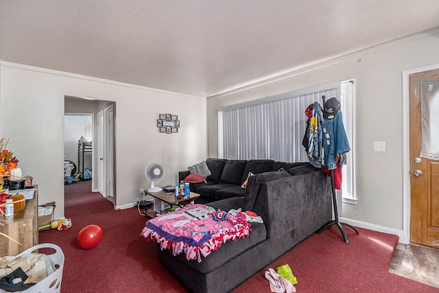 living room with dark carpet and ornamental molding