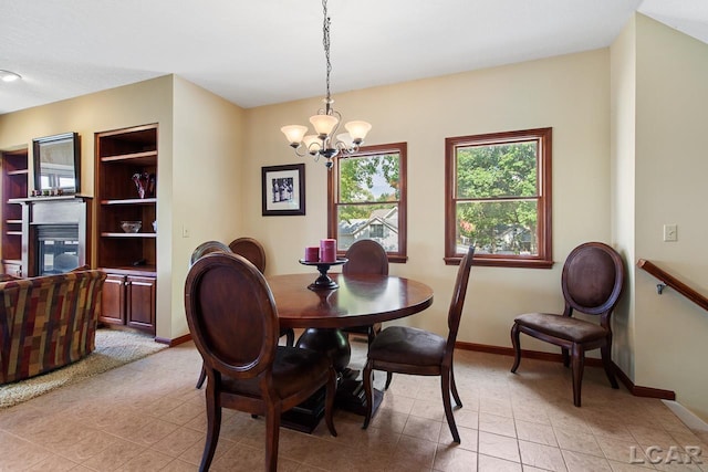 tiled dining area featuring a notable chandelier