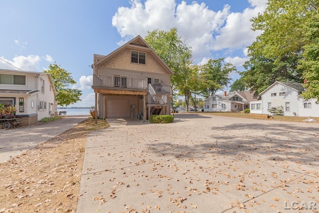 rear view of house with a garage