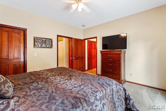 bedroom with ceiling fan and light colored carpet