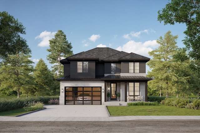 view of front facade featuring a garage and a front lawn