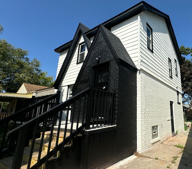 view of home's exterior with a deck