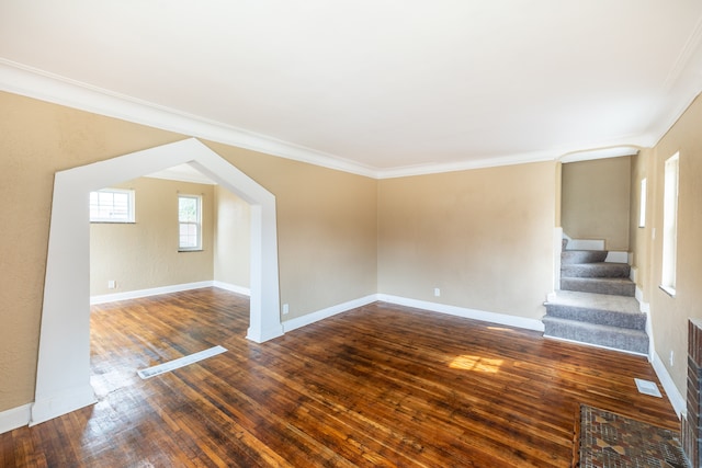 16184 Manor St, Detroit, MI 48221 - unfurnished living room with ornamental molding, hardwood / wood-style flooring, stairway, and baseboards