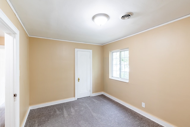 16184 Manor St, Detroit, MI 48221 - empty room with dark colored carpet, ornamental molding, and baseboards