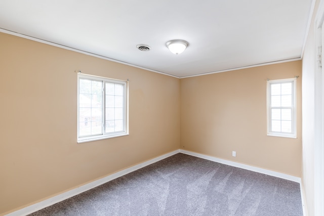 16184 Manor St, Detroit, MI 48221 - carpeted spare room with crown molding, baseboards, and healthy amount of natural light