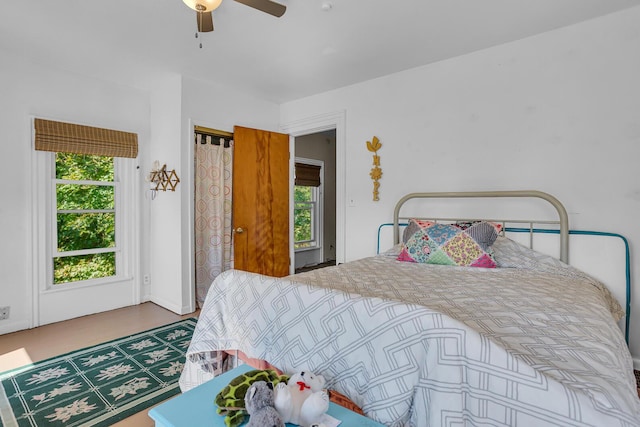 10526 Spring Arbor Rd, Spring Arbor, MI 49283 - bedroom with multiple windows and ceiling fan