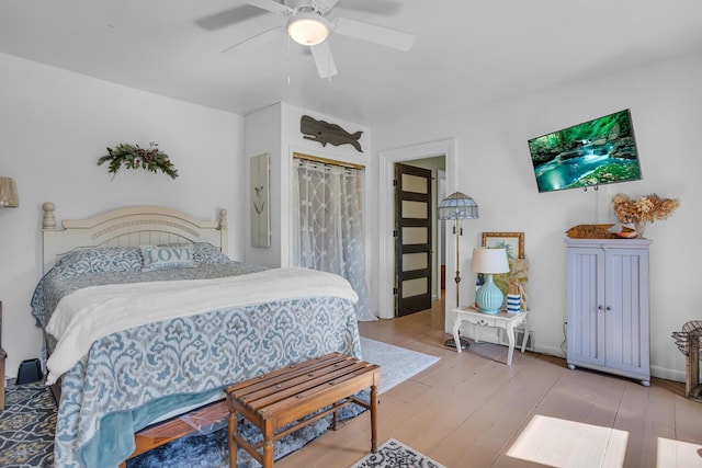 10526 Spring Arbor Rd, Spring Arbor, MI 49283 - bedroom with wood finished floors and ceiling fan