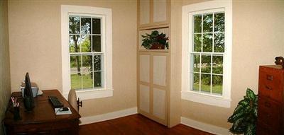 5295 Belding Rd NE, Rockford, MI 49341 - doorway featuring baseboards and dark wood-style floors