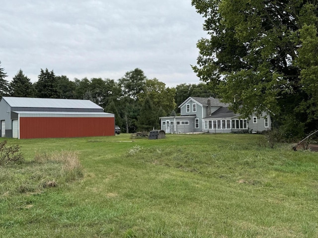 5295 Belding Rd NE, Rockford, MI 49341 - view of grassy yard with an outbuilding