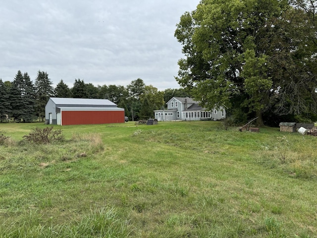 5295 Belding Rd NE, Rockford, MI 49341 - view of grassy yard with an outbuilding