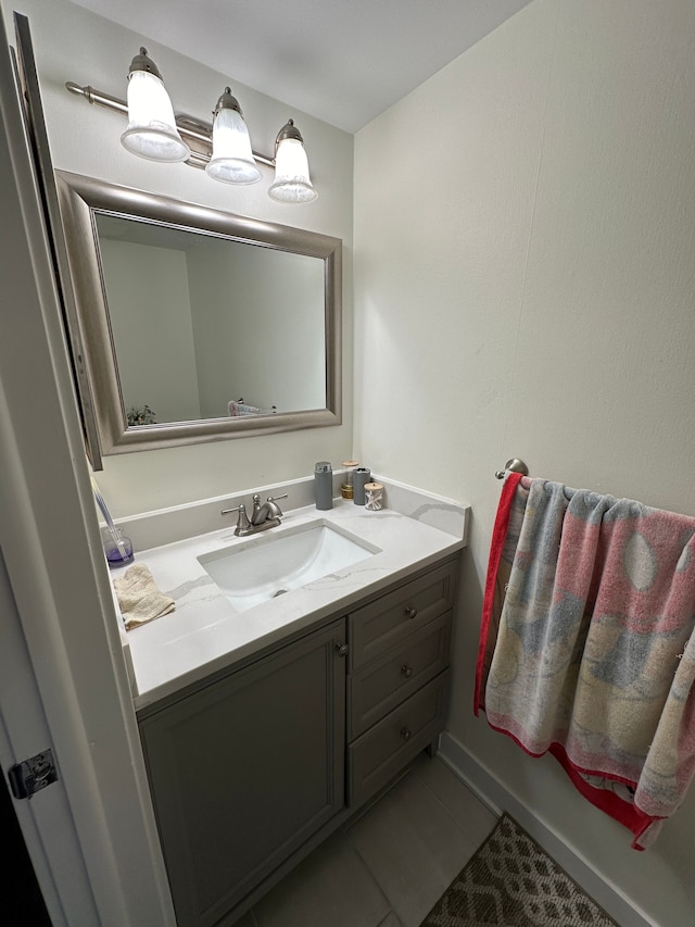 bathroom with vanity and tile patterned floors