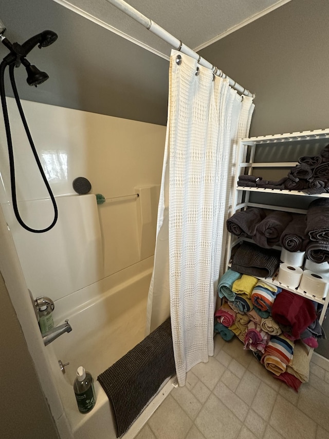 bathroom featuring shower / bath combination with curtain