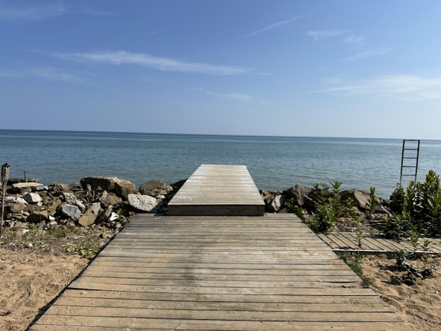 view of dock with a water view