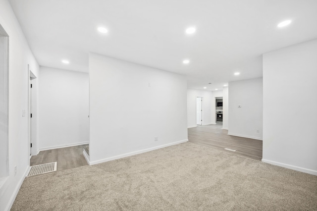 unfurnished room featuring light hardwood / wood-style floors