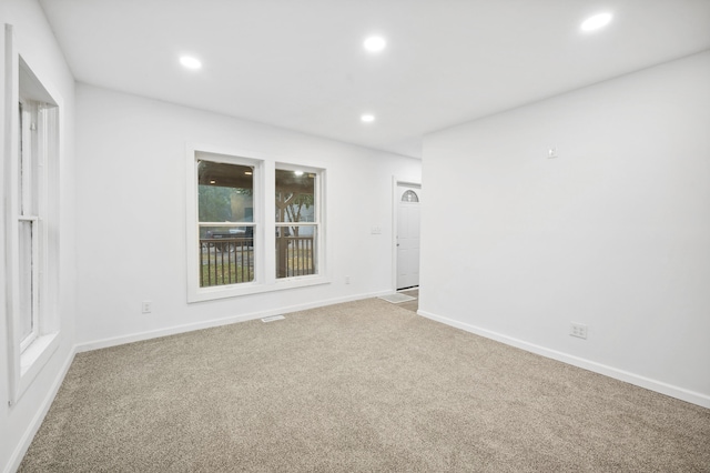 view of carpeted spare room