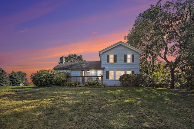 view of front of house featuring a yard