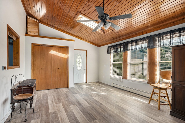 entryway featuring light wood-type flooring, wood ceiling, ceiling fan, a baseboard heating unit, and lofted ceiling