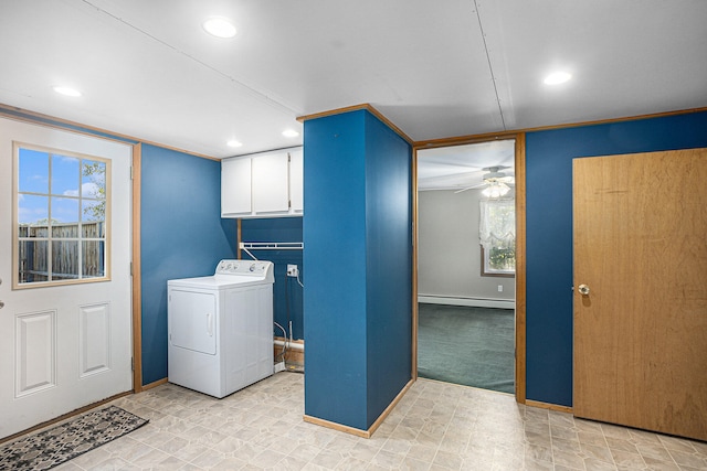 laundry area with cabinets, crown molding, ceiling fan, a baseboard radiator, and washer / dryer