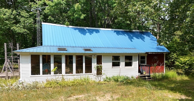3376 Swihart Rd, Brethren, MI 49619 - view of front of home with metal roof