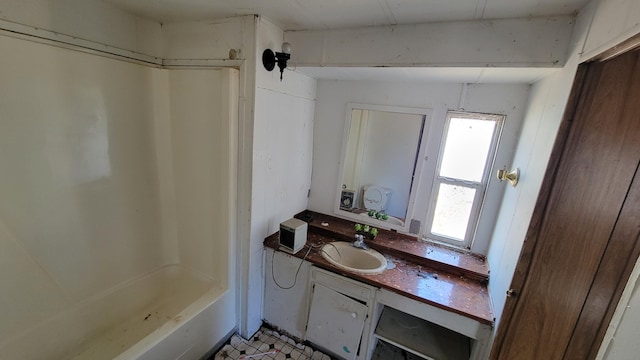 bathroom with vanity and plus walk in shower