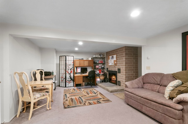 carpeted living room featuring a fireplace