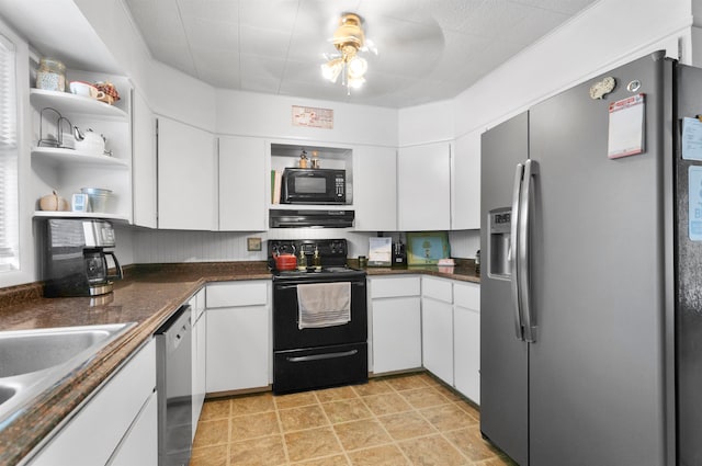 kitchen with black appliances, white cabinetry, and sink