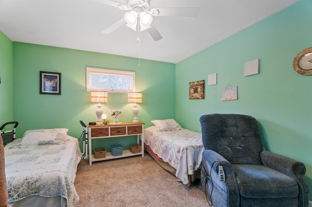 bedroom featuring ceiling fan and light colored carpet